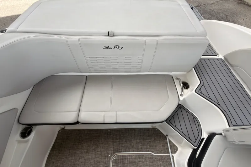 Slide: The Image of 2021 Sea Ray SPX 190 boat interior with gray seating and flooring. - 22