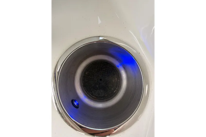 Slide: The Image of Cup holder with blue LED light on 2021 Sea Ray SPX 190 boat. - 37