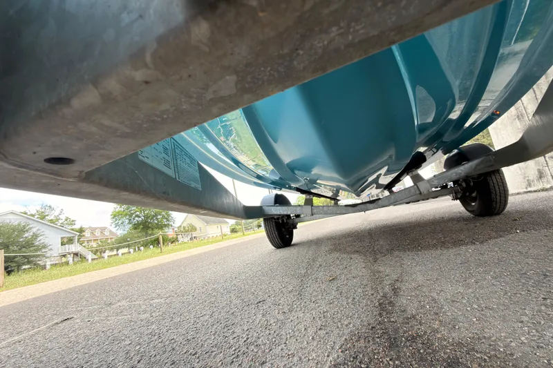 Slide: The Image of Underneath view of a 2021 Sea Ray SPX 190 boat on a trailer. - 39