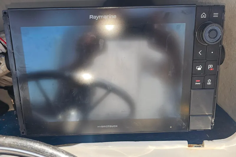 Slide: The Image of Raymarine HybridTouch display on 1988 Rampage 31 Express boat dashboard. - 19
