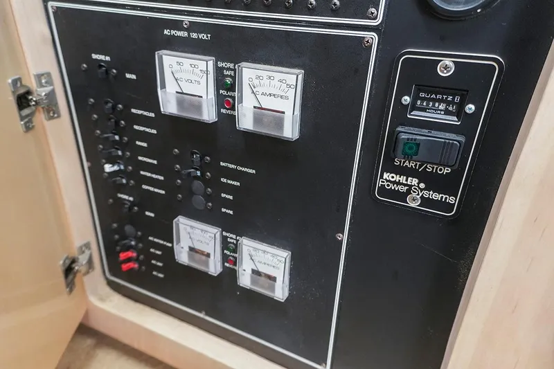 Slide: The Image of Electrical control panel of a 2000 Carver 350 Mariner boat with Kohler power system. - 20
