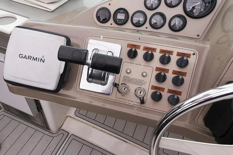 Slide: The Image of Control panel of a 2000 Carver 350 Mariner with Garmin navigation system. - 3