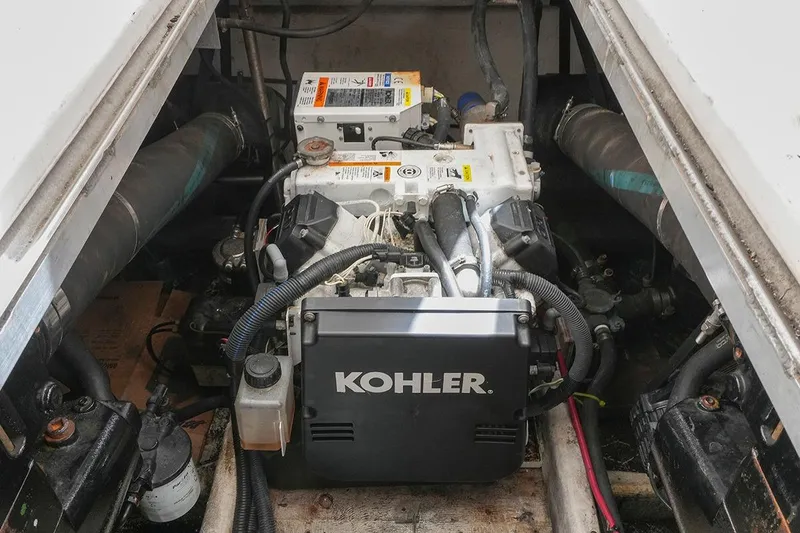 Slide: The Image of Engine compartment of a 2000 Carver 350 Mariner with Kohler generator. - 39