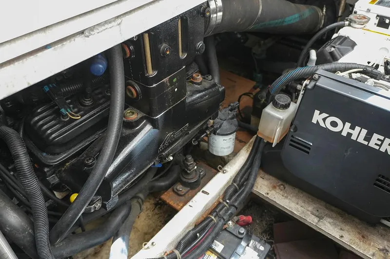 Slide: The Image of Engine compartment of a 2000 Carver 350 Mariner with Kohler generator visible. - 40