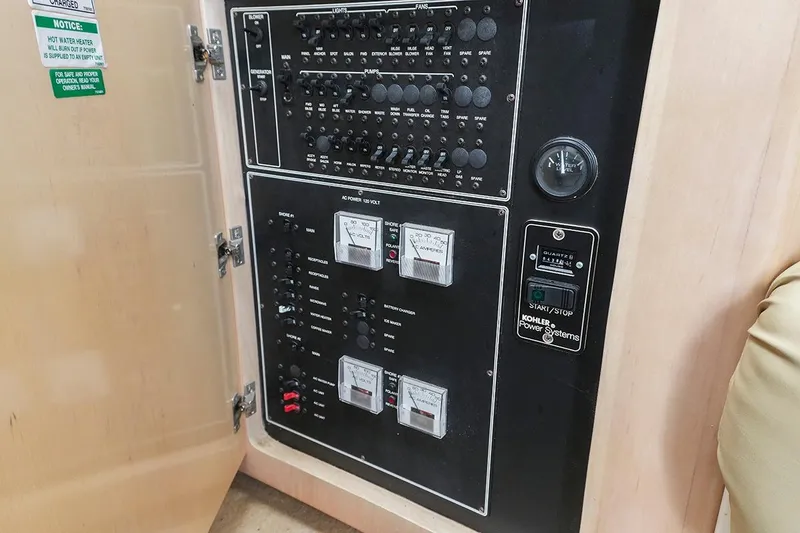 Slide: The Image of Electrical control panel on a 2000 Carver 350 Mariner boat. - 51