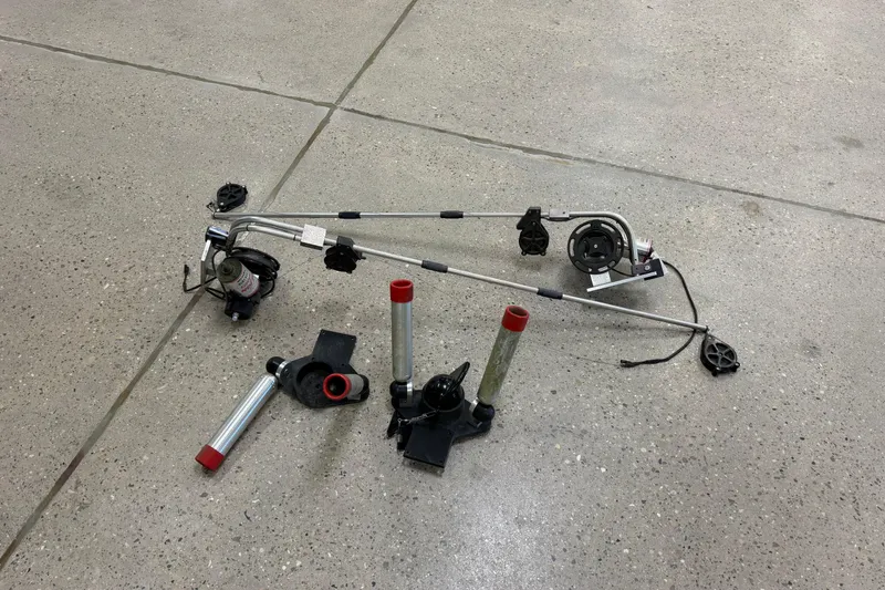 Slide: The Image of Boat equipment on concrete floor, possibly for a 2006 Pursuit 2570 Offshore model. - 36