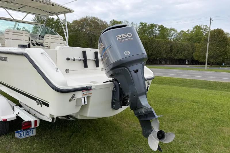 Slide: The Image of 2006 Pursuit 2570 Offshore boat with Yamaha 250 outboard motor on trailer. - 9