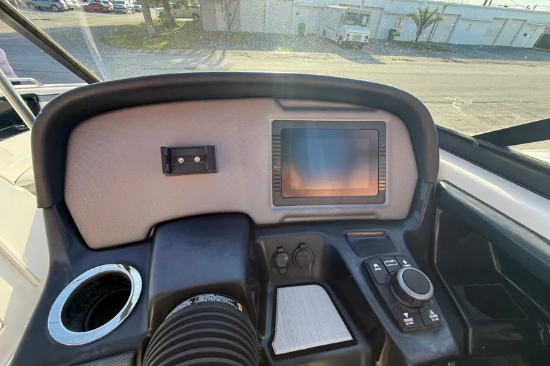 Slide: The Image of 2020 Yamaha Boats AR230 dashboard with touchscreen and controls, featuring a sleek design. - 19