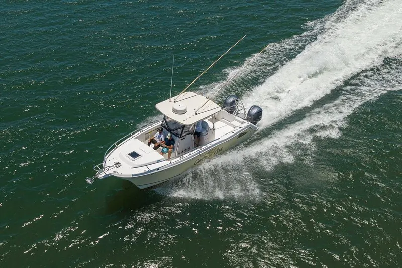 Slide: The Image of 2007 ProKat 2860 Center Console boat cruising on open water. - 17