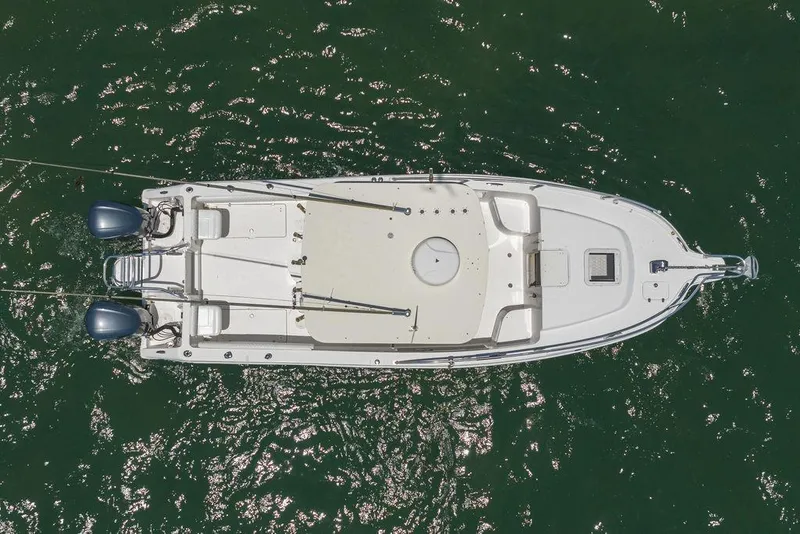 Slide: The Image of Overhead view of 2007 ProKat 2860 Center Console boat on water. - 25
