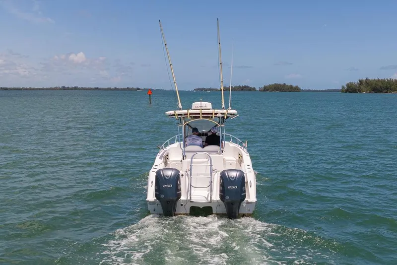 Slide: The Image of 2007 ProKat 2860 Center Console boat cruising on open water. - 26