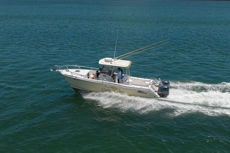 Slide: The Image of 2007 ProKat 2860 Center Console boat cruising on open water. - 28