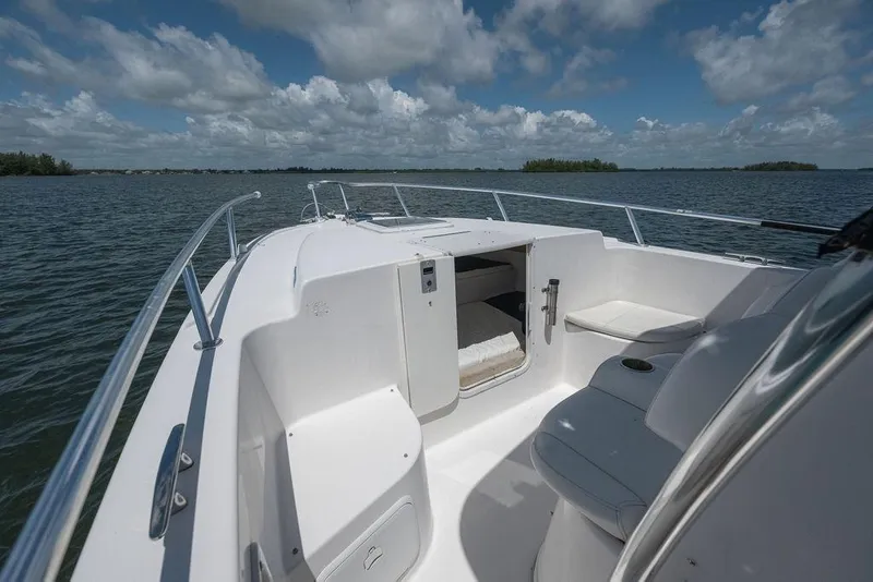 Slide: The Image of 2007 ProKat 2860 Center Console boat on open water under a cloudy sky. - 30
