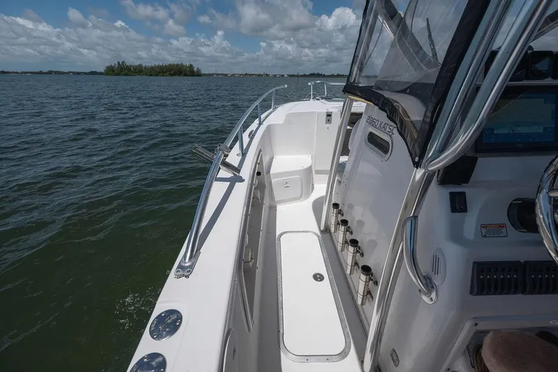 Slide: The Image of 2007 ProKat 2860 Center Console boat on open water under a partly cloudy sky. - 33