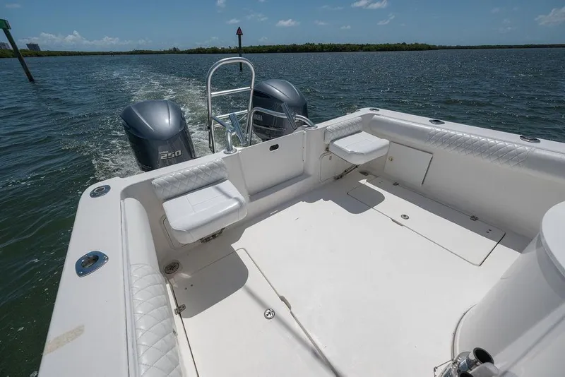 Slide: The Image of 2007 ProKat 2860 Center Console boat with dual Yamaha engines on open water. - 34