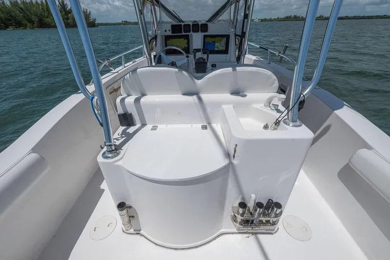 Slide: The Image of 2007 ProKat 2860 Center Console boat interior with steering console and rod holders. - 43