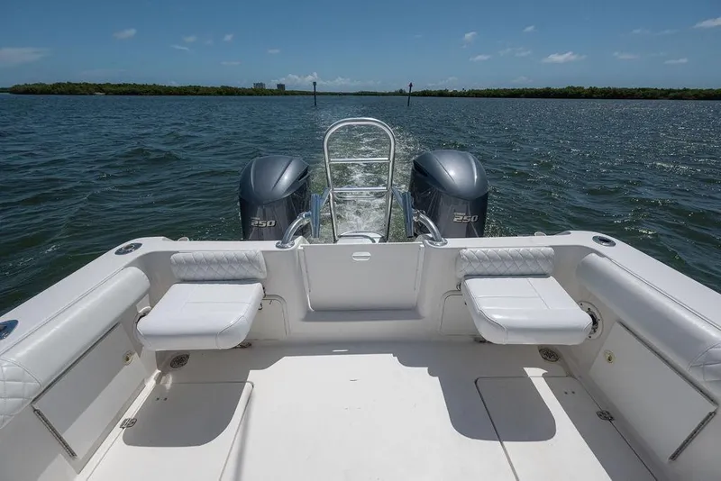 Slide: The Image of 2007 ProKat 2860 Center Console boat with dual engines on open water. - 46