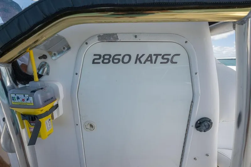 Slide: The Image of 2007 ProKat 2860 Center Console boat interior with safety equipment. - 48