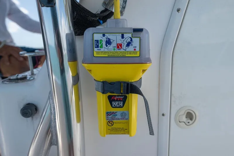 Slide: The Image of Yellow emergency beacon mounted on a 2007 ProKat 2860 Center Console boat. - 54