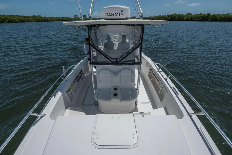 Slide: The Image of 2007 ProKat 2860 Center Console boat on water, featuring Garmin equipment. - 58