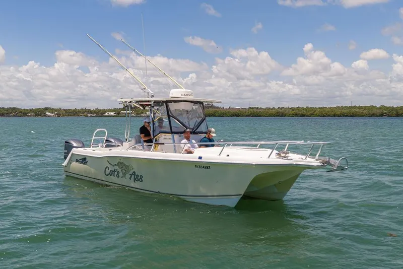 Slide: The Image of 2007 ProKat 2860 Center Console boat cruising on a sunny day. - 6