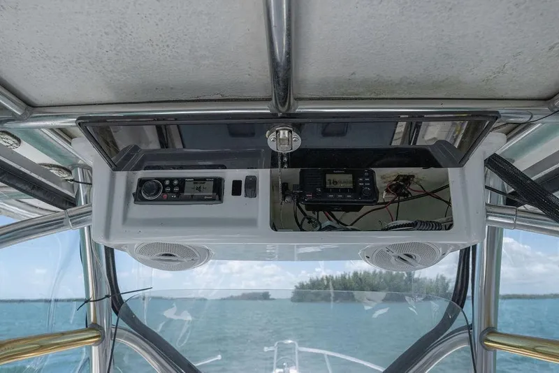Slide: The Image of 2007 ProKat 2860 Center Console boat electronics panel with ocean view. - 61