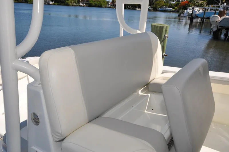 Slide: The Image of 2011 Yellowfin 39 Offshore boat seating with waterfront view. - 26
