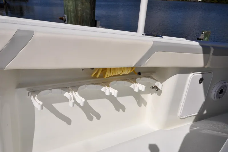 Slide: The Image of Interior view of 2011 Yellowfin 39 Offshore boat with rod holders and storage compartment. - 35