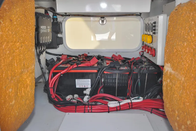 Slide: The Image of Electrical system of a 2011 Yellowfin 39 Offshore boat with batteries and wiring. - 37