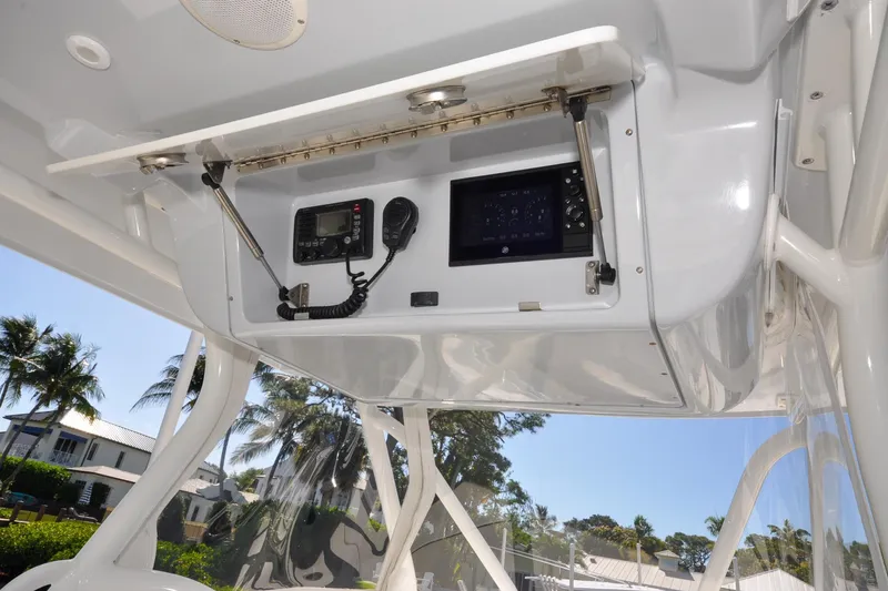 Slide: The Image of Control console of a 2011 Yellowfin 39 Offshore boat with electronics. - 6