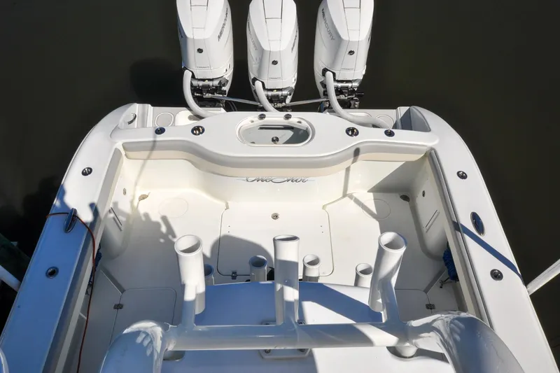 Slide: The Image of 2011 Yellowfin 39 Offshore boat deck with triple outboard engines. - 9