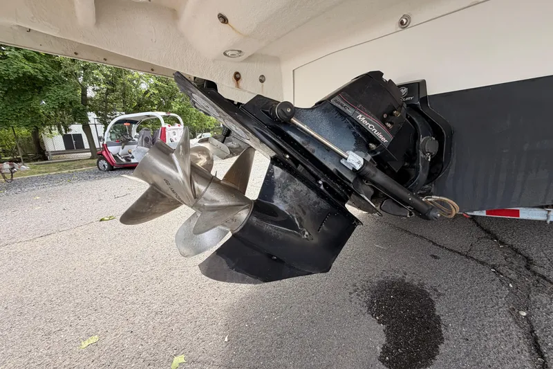 Slide: The Image of Outboard motor of a 2011 Sea Ray 300 SLX boat on a trailer. - 7
