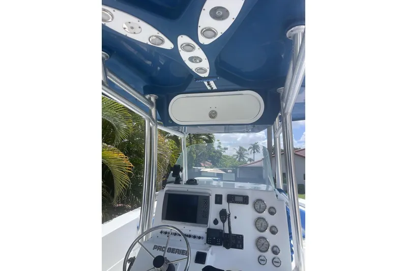 Slide: The Image of 2009 Sea Fox 288 Commander boat dashboard with gauges and navigation equipment. - 10