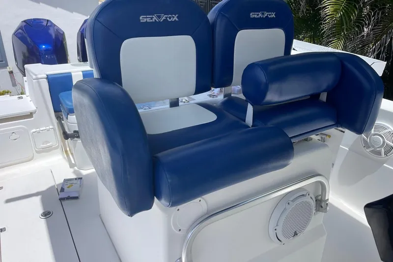 Slide: The Image of Blue and white seating on 2009 Sea Fox 288 Commander boat deck. - 12