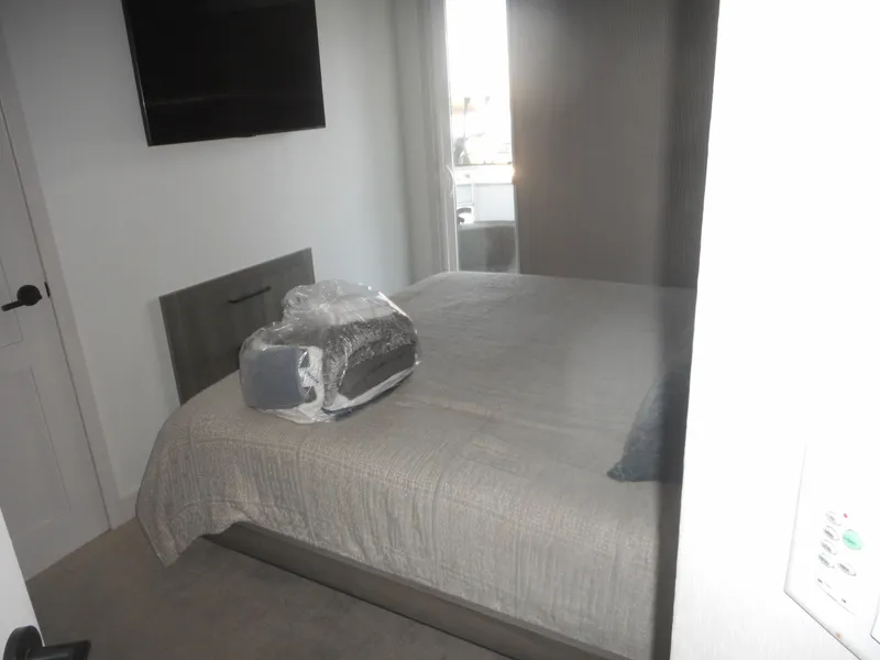 Slide: The Image of Cozy bedroom in Adonia Obsession Trip #12, 2021 model, with neatly arranged bedding. - 10