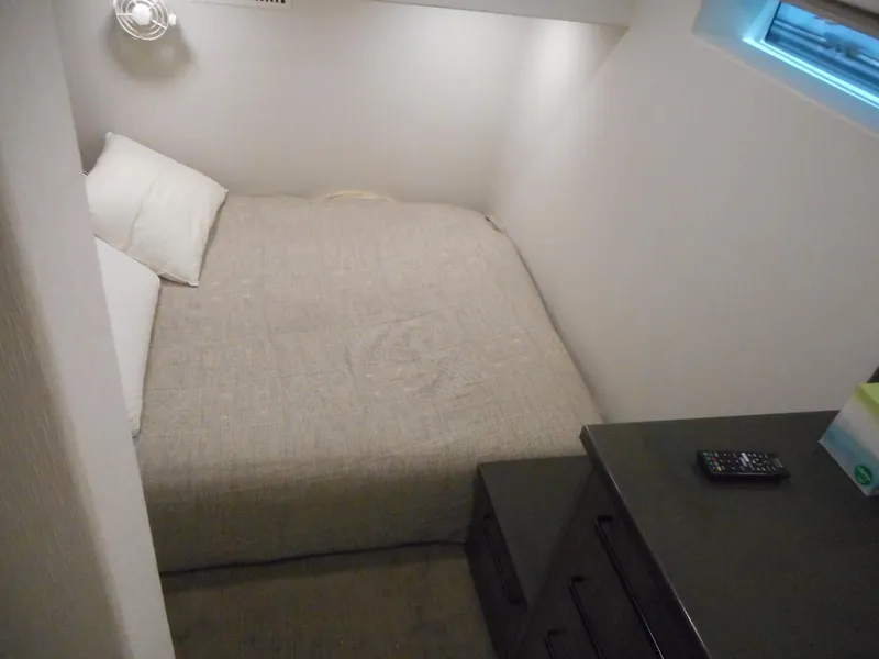 Slide: The Image of Compact bedroom in Adonia Obsession Trip #12, 2021 model, featuring a cozy bed and modern decor. - 12
