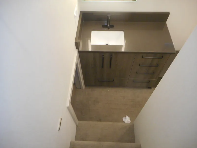 Slide: The Image of Narrow bathroom with sink and cabinet, viewed from stairs. Adonia Obsession Trip #12, 2021. - 14