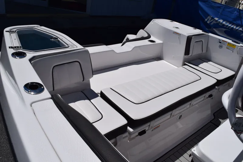 Slide: The Image of Interior of 2026 Yamaha Boats 255 FSH Sport H with white upholstery. - 12