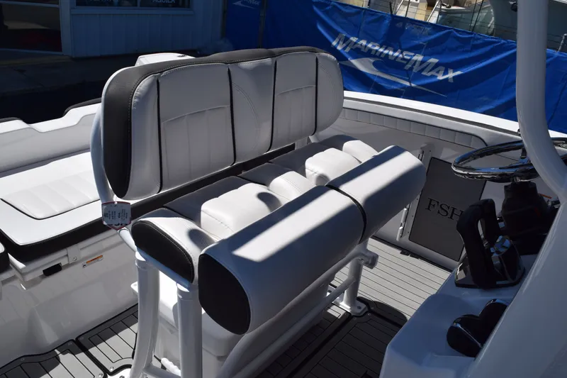 Slide: The Image of Interior of Yamaha Boats 255 FSH Sport H 2026 with seating area. - 16