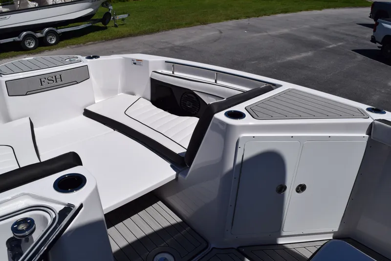 Slide: The Image of Interior of Yamaha Boats 255 FSH Sport H 2026 with seating area. - 26