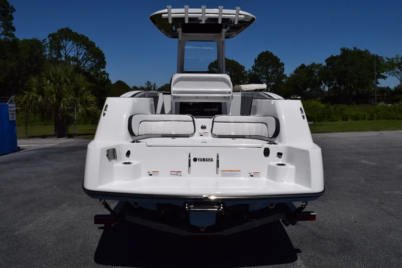 Slide: The Image of Rear view of 2026 Yamaha Boats 255 FSH Sport H on parking lot. - 7