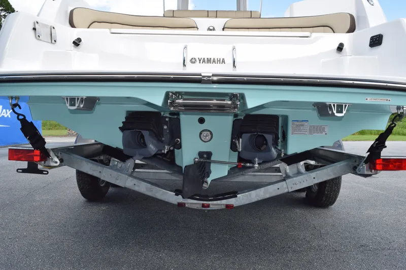 Slide: The Image of Rear view of Yamaha 222FSH SP E boat, 2026 model, on a trailer. - 1