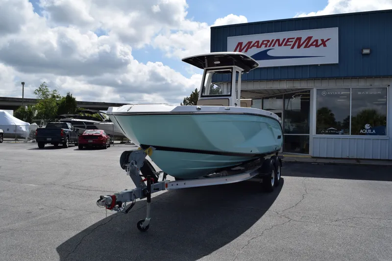 Slide: The Image of 2026 Yamaha Boats 222FSH SP E outside MarineMax building. - 21