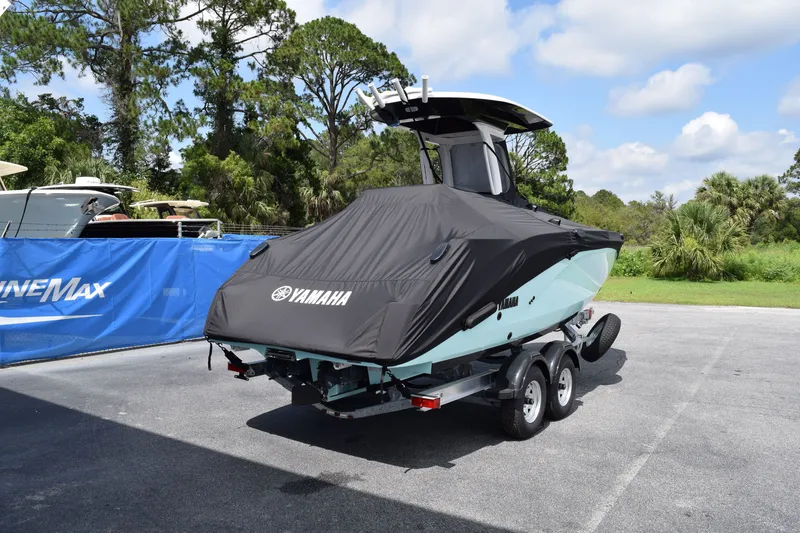 Slide: The Image of Yamaha 222FSH SP E 2026 boat with cover on trailer. - 23