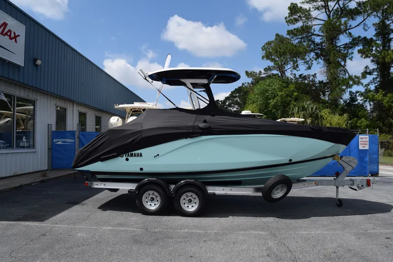 Slide: The Image of Yamaha 222FSH SP E 2026 boat on trailer, blue and black, at MarineMax. - 24