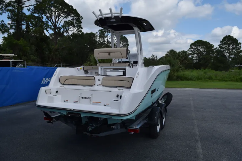 Slide: The Image of Yamaha Boats 222FSH SP E 2026 on trailer, parked outdoors. - 4