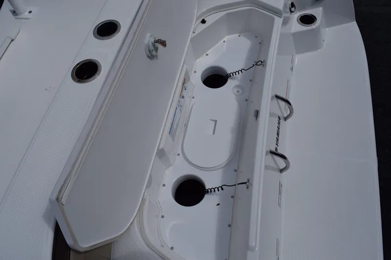 Slide: The Image of Interior view of 2026 Yamaha Boats 222FSH SP E with storage compartment. - 6