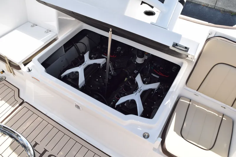 Slide: The Image of Yamaha Boats 222FSH SP E 2026 engine compartment with open hatch. - 8