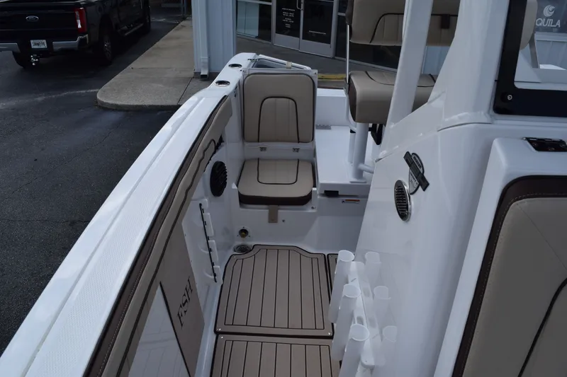 Slide: The Image of Interior of 2026 Yamaha Boats 222FSH SP E with seating and storage. - 9