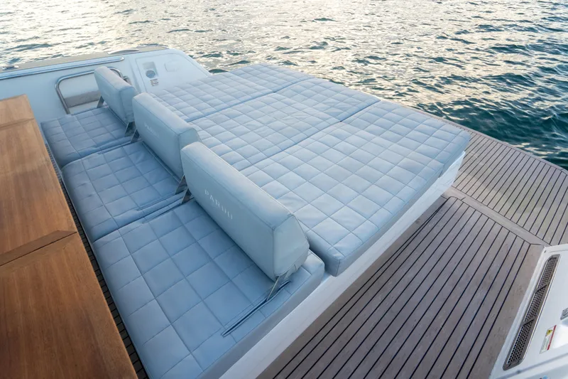 Slide: The Image of Luxurious sunbed on 2021 Pardo Yachts 43, overlooking serene ocean waters. - 13